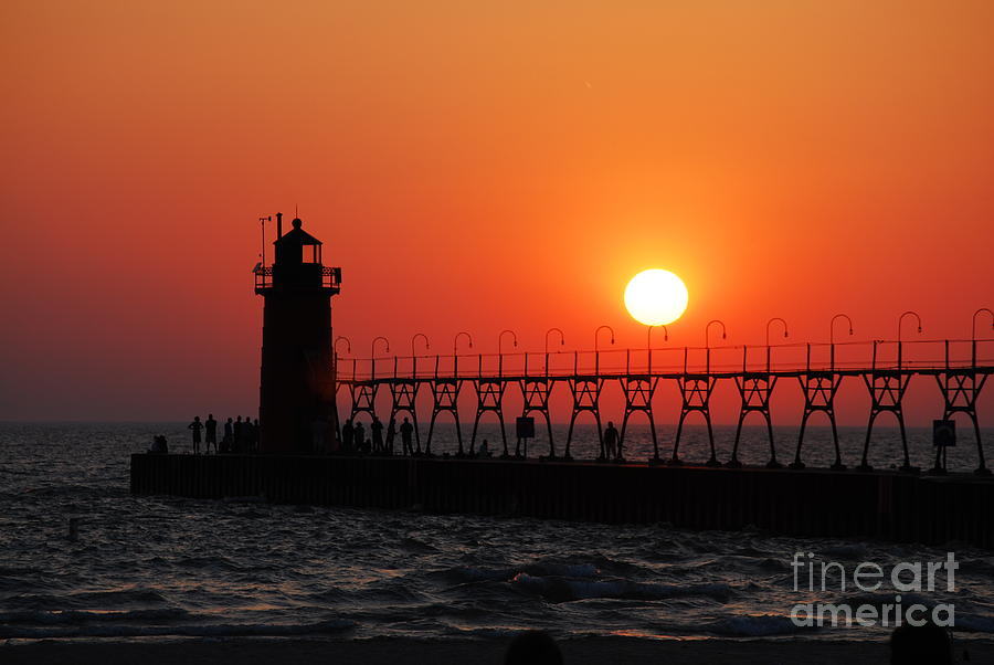 South Haven Lighthouse at Sunset 1 Photograph by Nancy Mueller