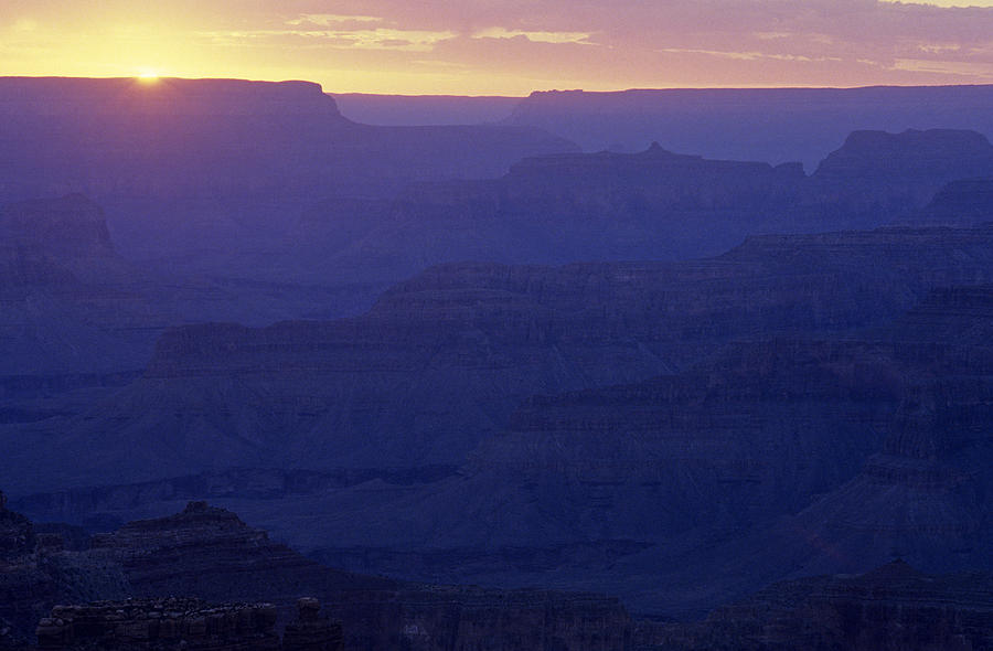 South Rim Grand Canyon sunset light on rock formations Arizona S Photograph by Jim Corwin