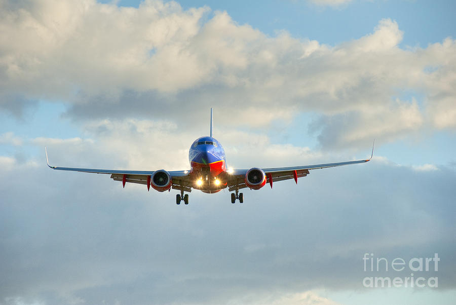 Southwest Airline Photograph - Southwest Airline Landing gear Down by David Zanzinger