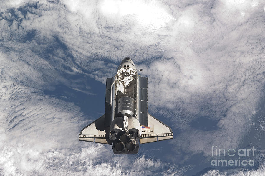 Space Photograph - Space Shuttle Atlantis Above A Cloud by Stocktrek Images
