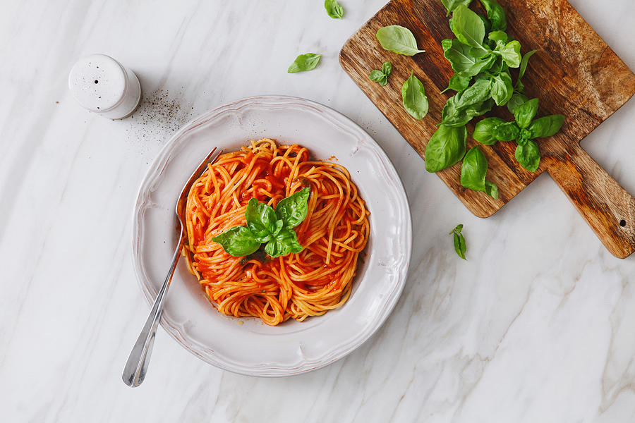 Spaghetti with tomato sauce Photograph by Eugene Mymrin