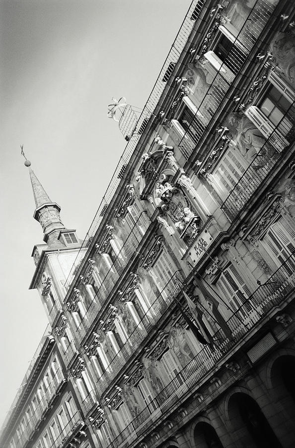 Spain, Madrid, Plaza Mayor, building exterior, low angle view (B&W) Photograph by Steve Cole