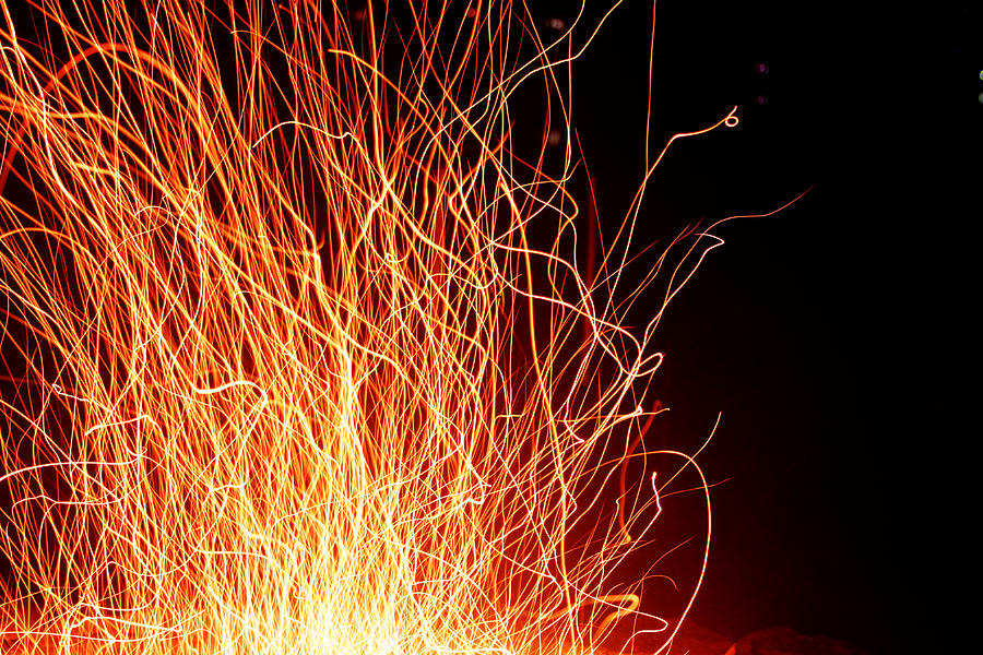 Sparks one Photograph by Ric Mulligan - Fine Art America