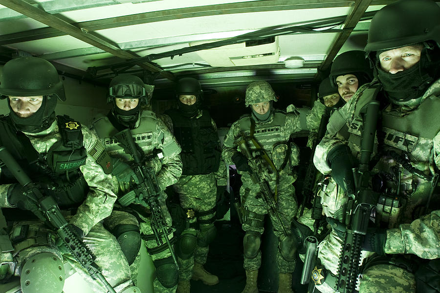Special forces tactical unit preparing for raid Photograph by Dstephens