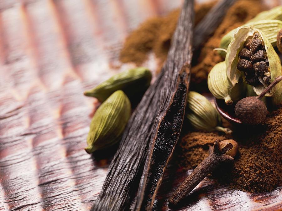 Still Life Photograph - Spices For Baking (vanilla Pods, Cardamom And Cloves) by Eising Studio - Food Photo and Video
