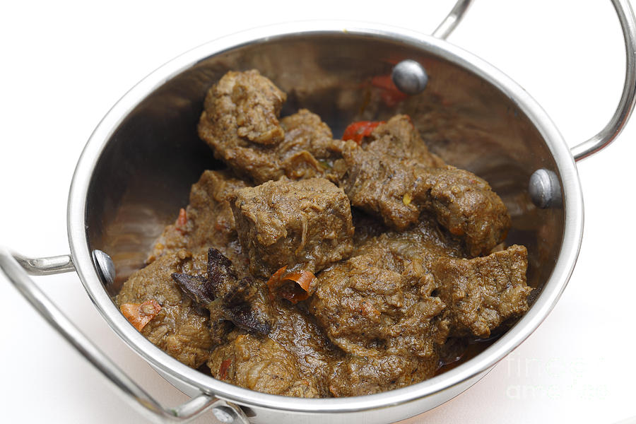 Spicy Madras beef curry in kadai Photograph by Paul Cowan