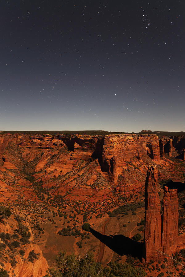 Spider Rock in  Canyon de Chelly in the moonlight Photograph by Jean Clark