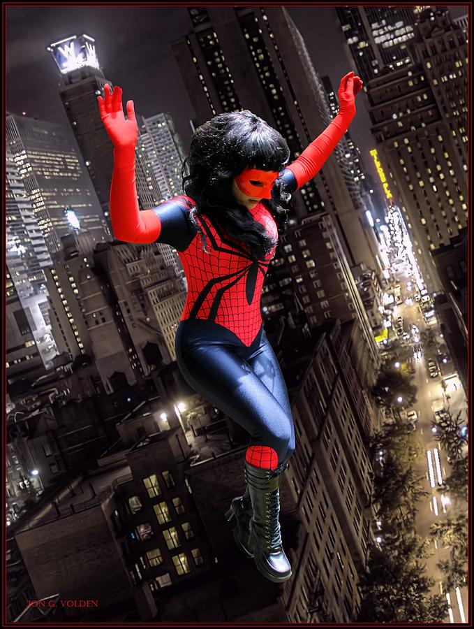 Spider Gal Leaping Photograph by Jon Volden