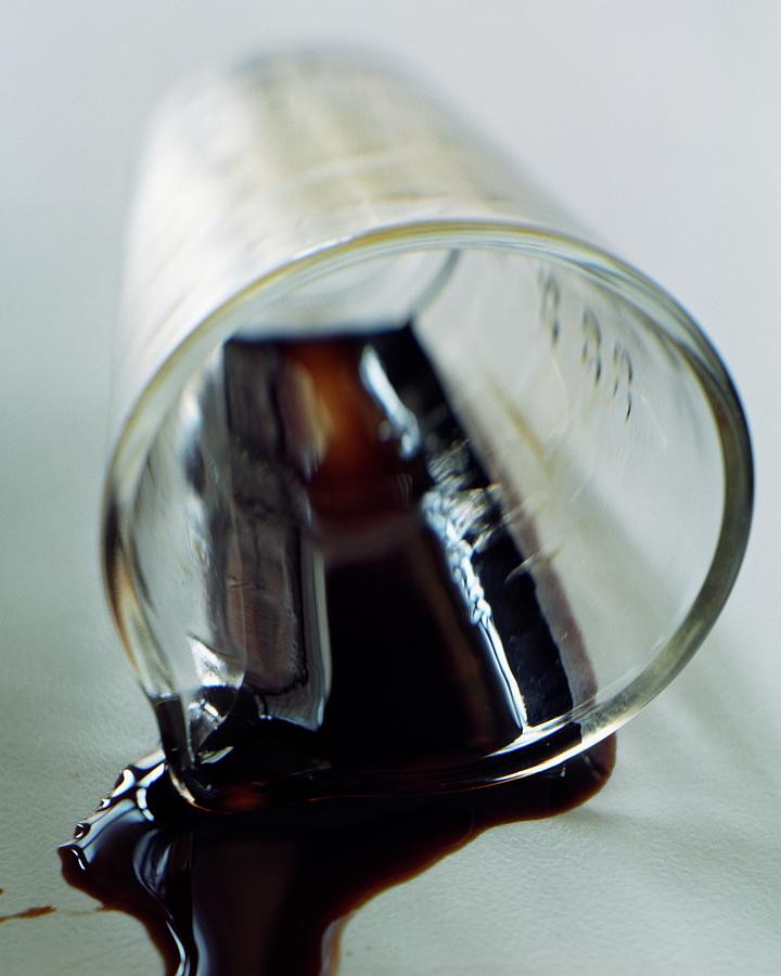 Spilled Balsamic Vinegar Photograph by Romulo Yanes