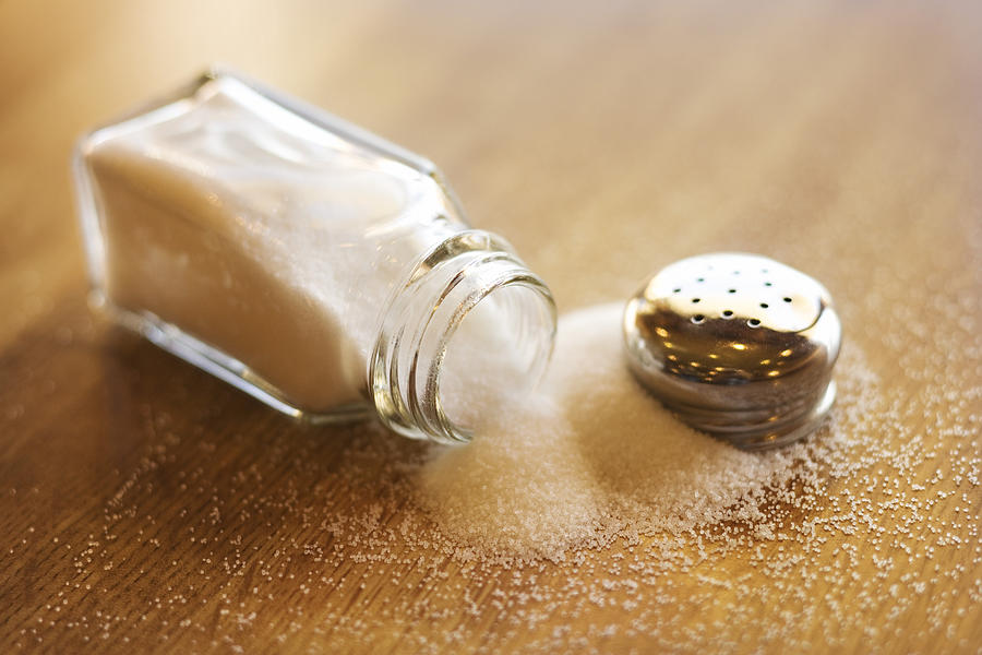 Spilled salt shaker Photograph by Thinkstock