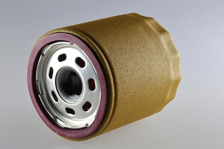 Spin-on canister oil filter showing seal and screw-on thread Photograph by Douglas Sacha