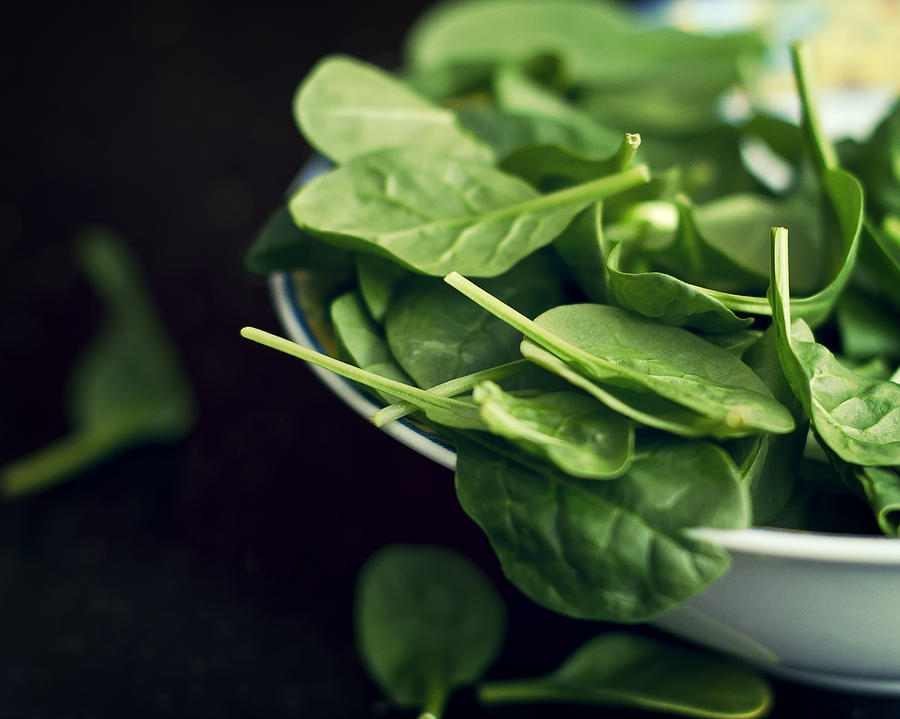 Spinach salad in bowl Photograph by Calvert Byam