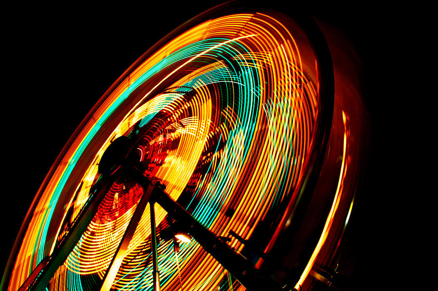 Spinning Wheel Photograph by Rich Franco