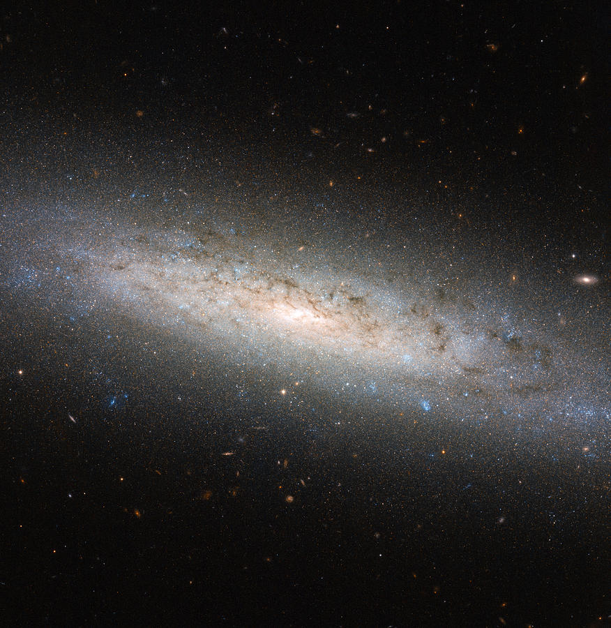 Spiral Galaxy Ngc 24 Photograph by Science Source
