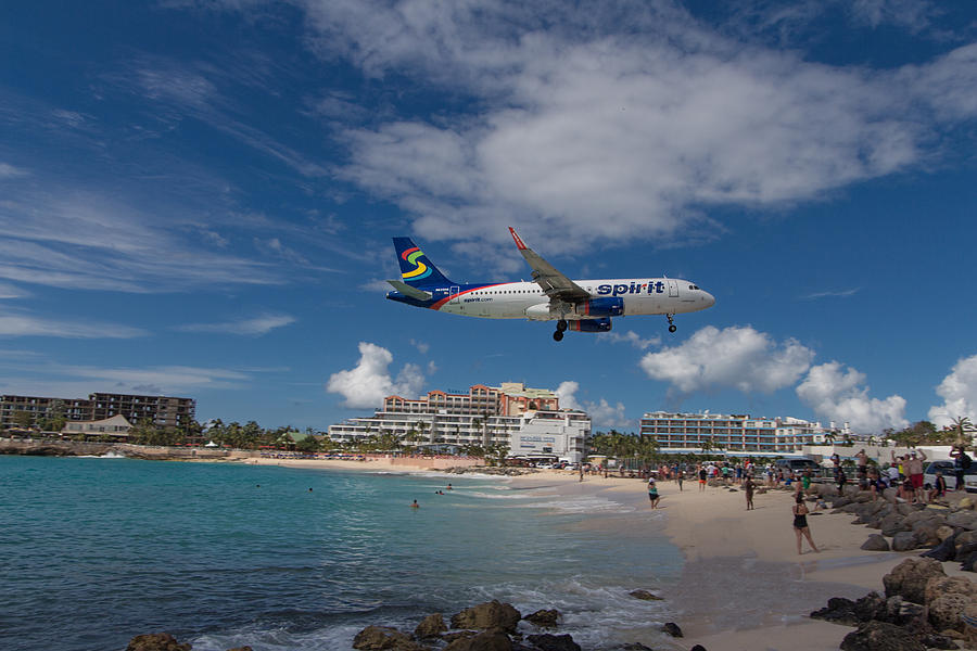 Spirit Airlines landing at St. Maarten Photograph by David Gleeson