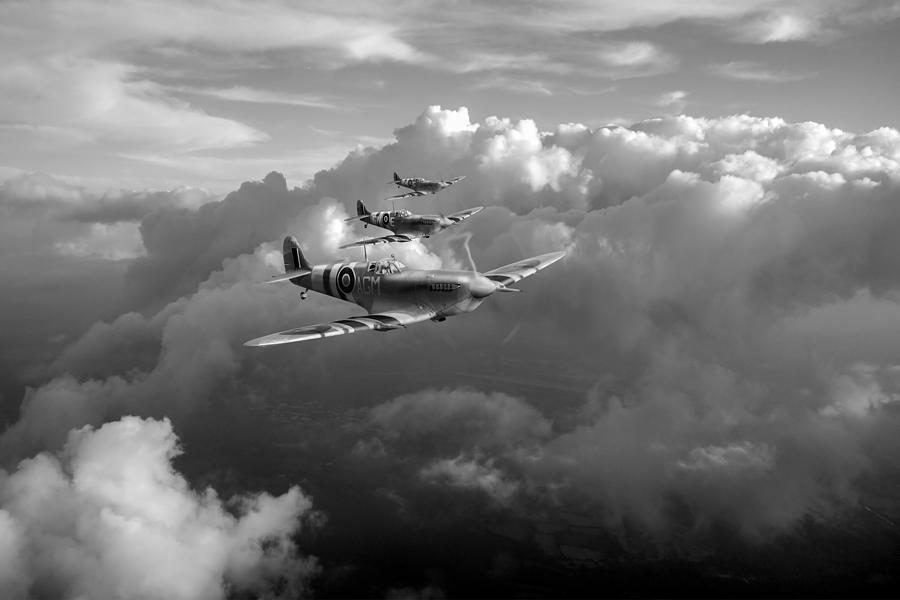 Spitfires among clouds black and white version Photograph by Gary Eason