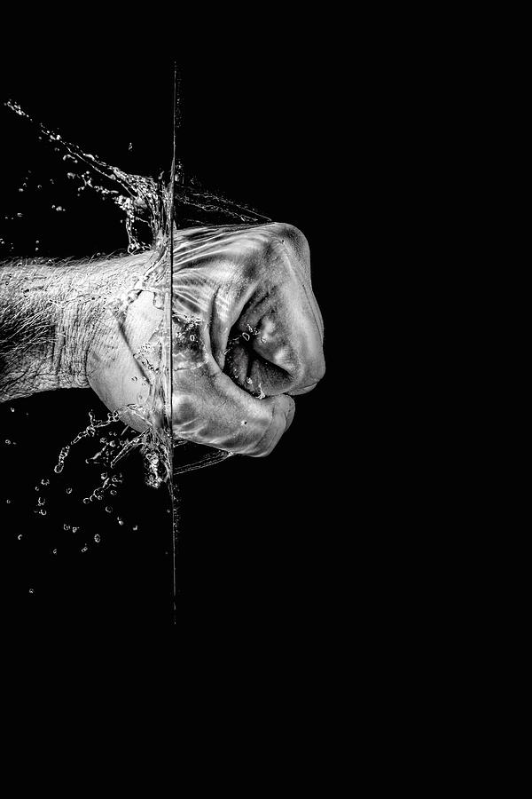 Splashing Fist Photograph by Peter Lakomy