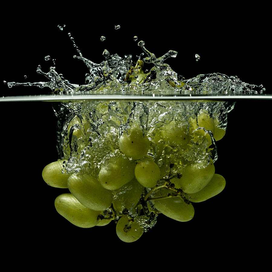Splashing grapes Photograph by Mike Santis