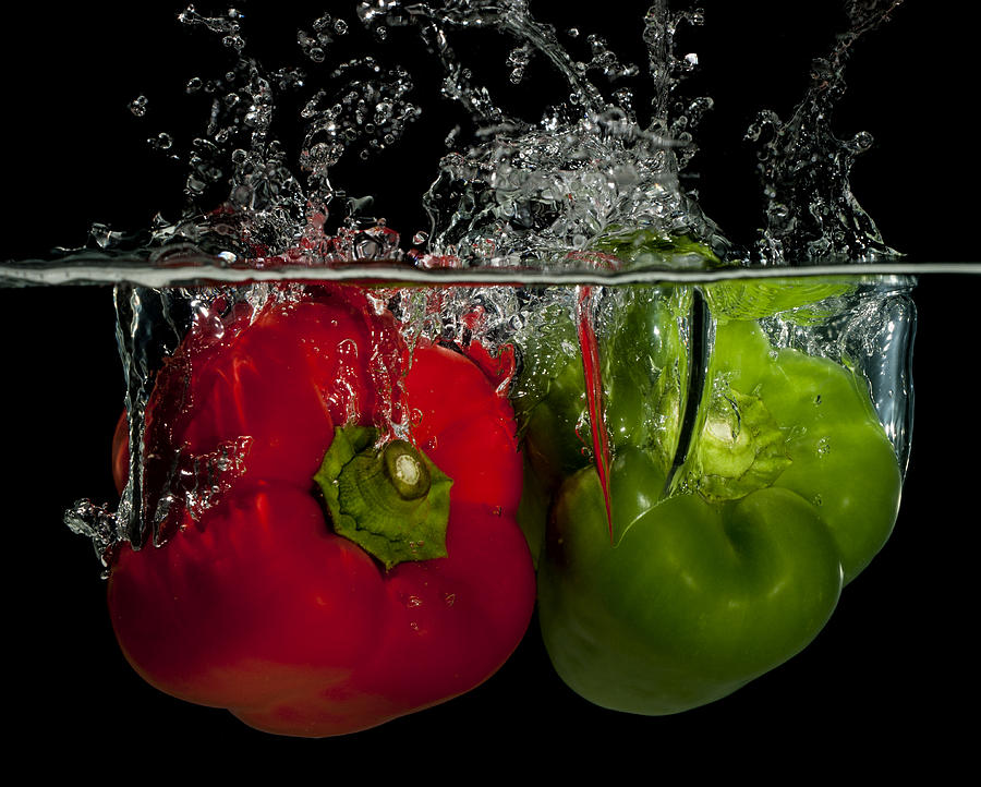 Splashing peppers Photograph by Mike Santis