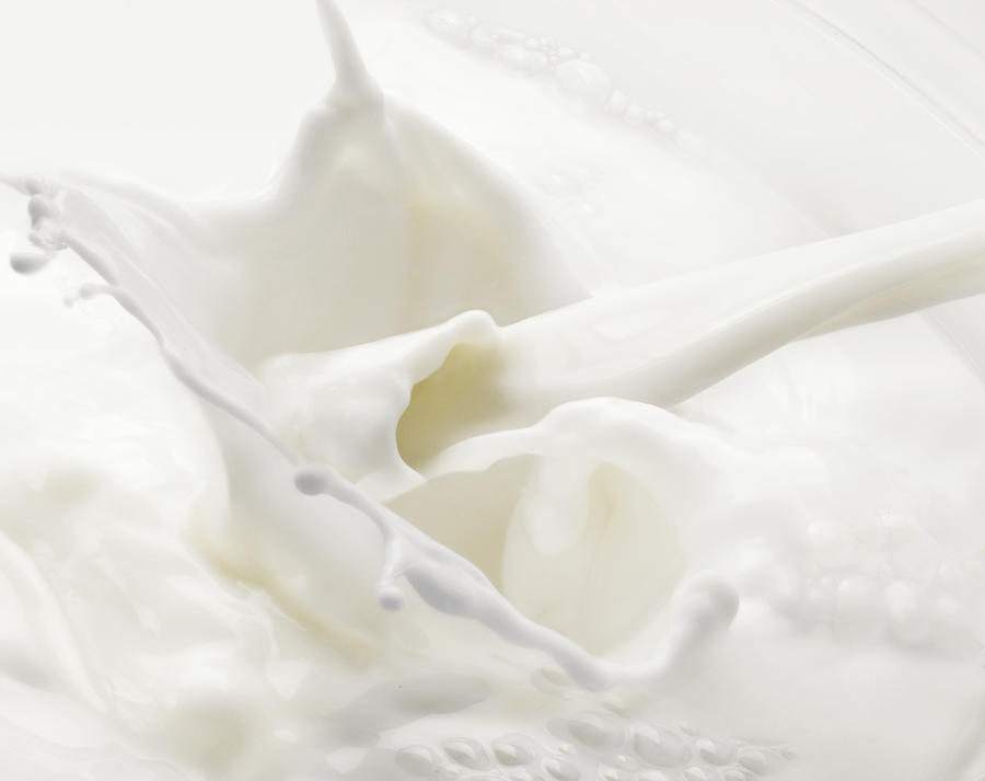 Splashing Poured Milk Photograph by Chris Ted