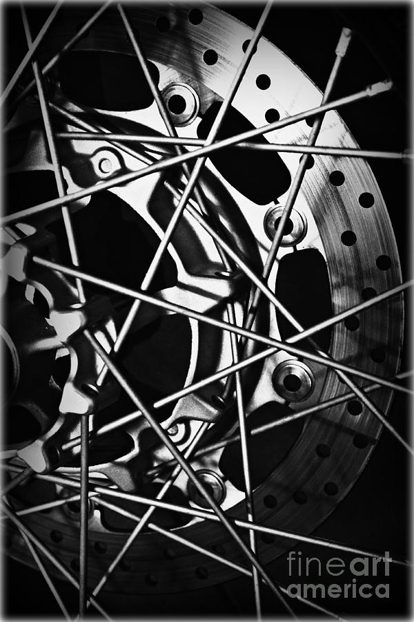 Black And White Photograph - Spokes by Clare Bevan