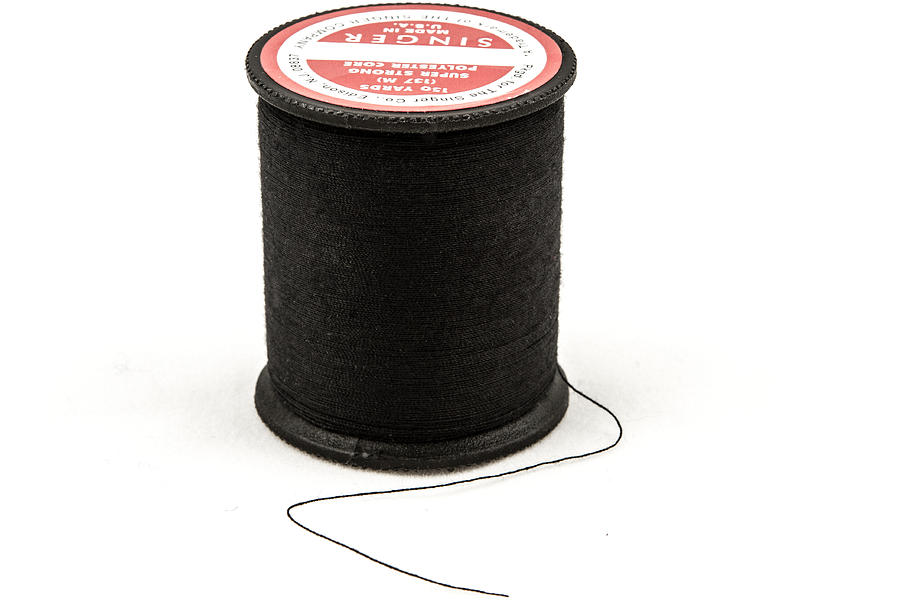 Thread Photograph - Spool of Black Thread by Mason Resnick