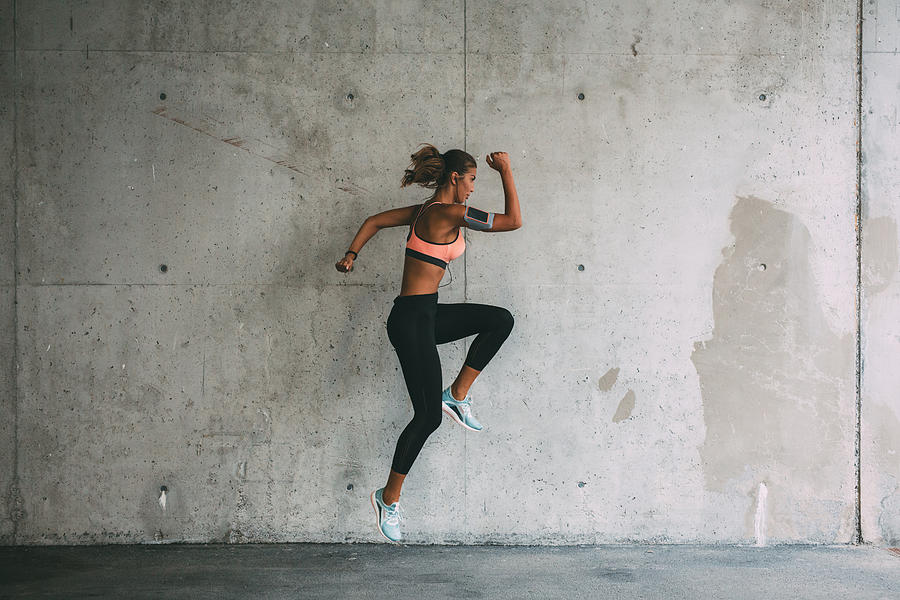Sportswoman jumping Photograph by Todor Tsvetkov