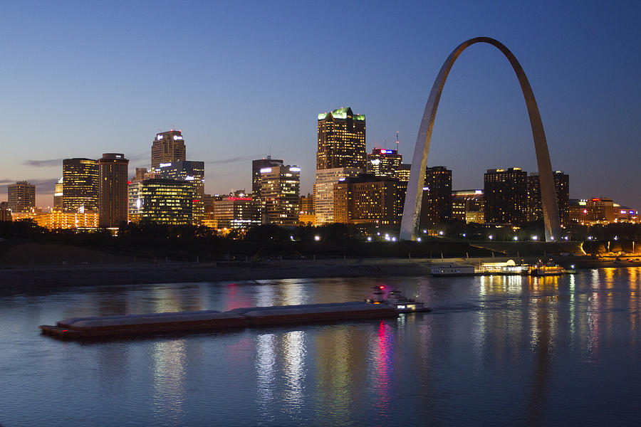St Louis skyline with barges Photograph by Garry McMichael