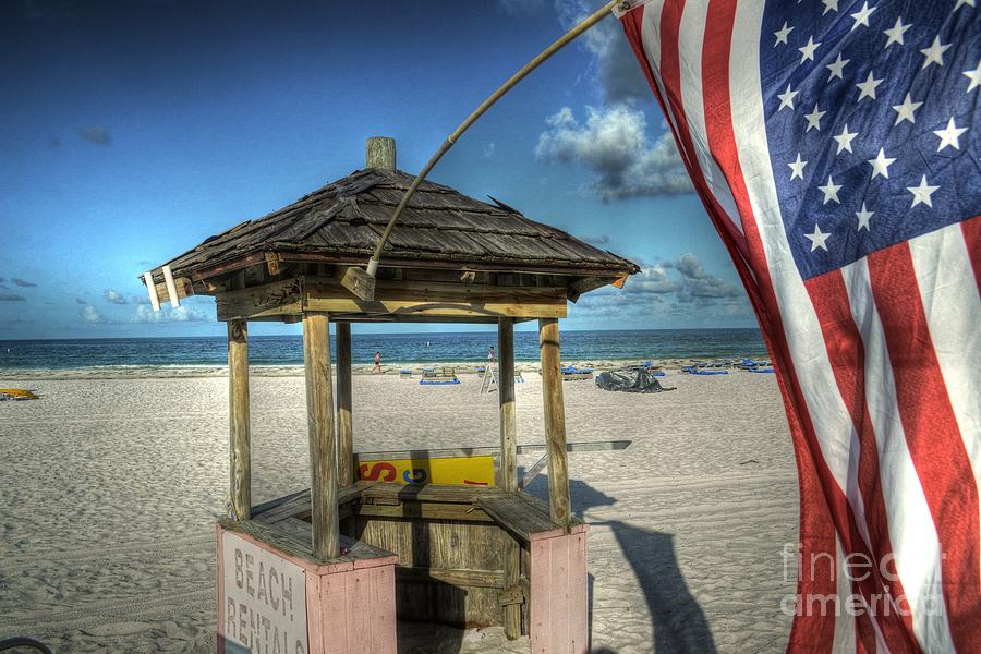 Beach Photograph - St. Pete Beach American Flag by Timothy Lowry