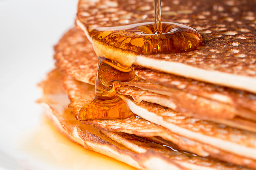 Stack of pancakes with maple syrup Photograph by Laurileesmaa