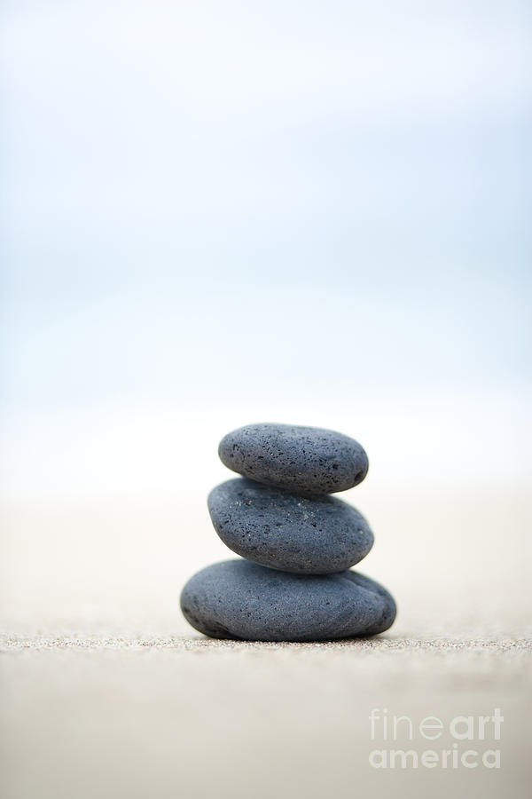 Stack of Stones on Sand Photograph by M Swiet Productions