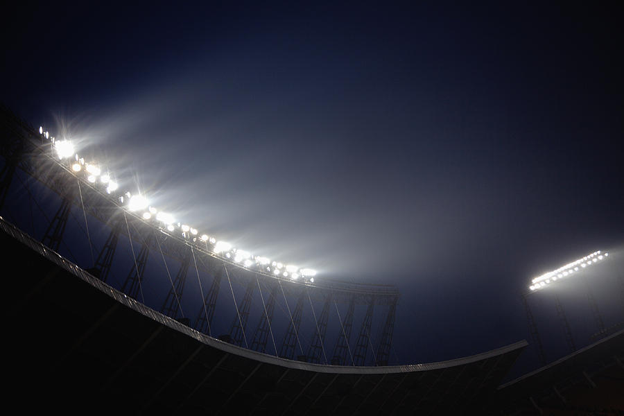 Stadium floodlights at night time, Beijing, China Photograph by XiXinXing