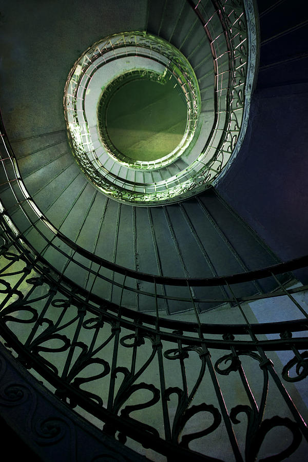Staircaise with metal spiral ornamented stairs Photograph by Jaroslaw Blaminsky