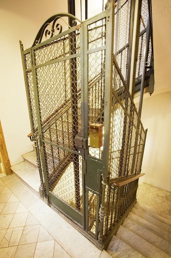 Stairway And Traditional Lift In Apartment Photograph by Ton Kinsbergen/science Photo Library
