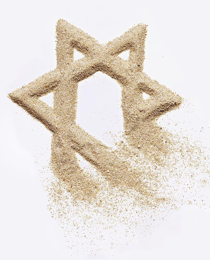 Star of David created in sand Photograph by Steve Wisbauer
