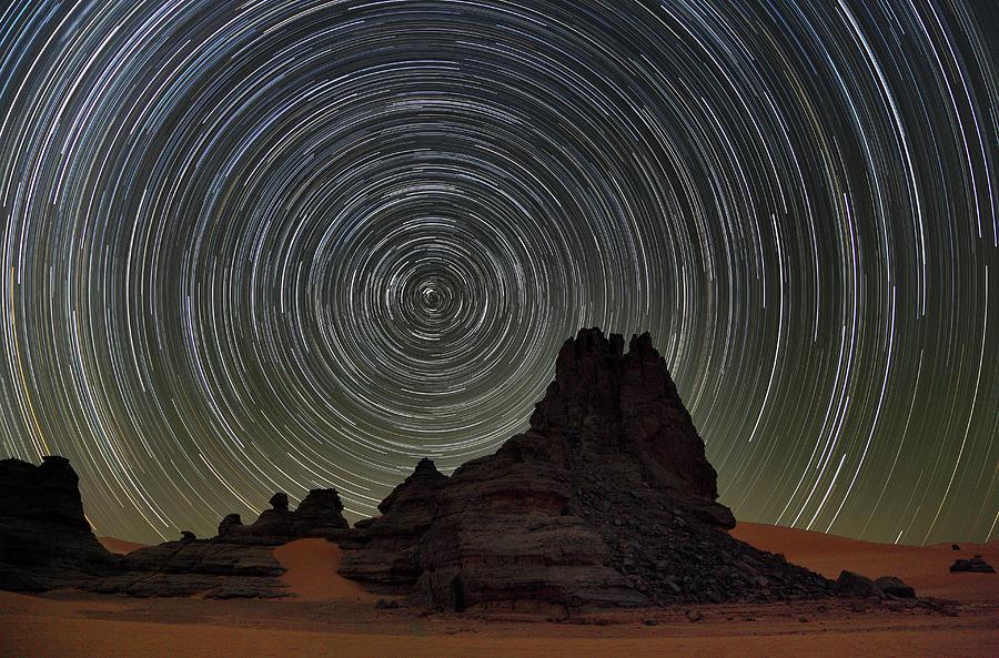 Star Trails Over Saharan Rock Formations Photograph by Martin Rietze