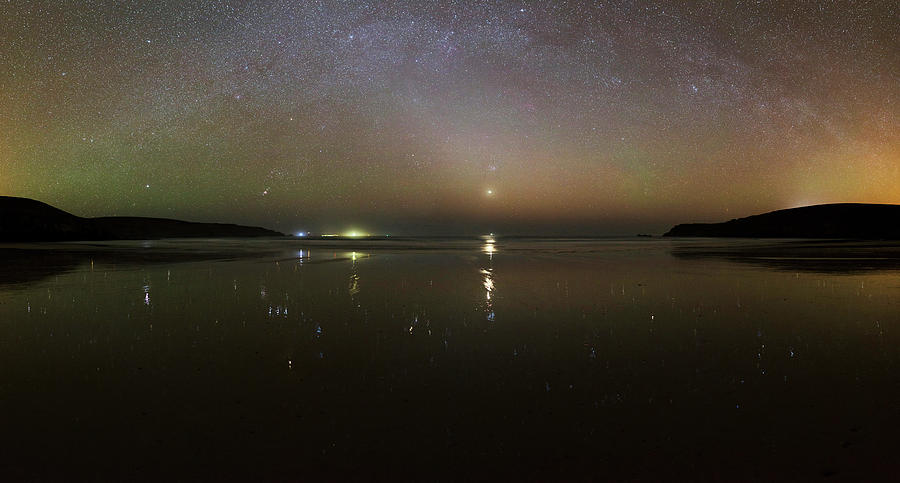 Starlight Reflected In A Bay At Night Photograph by Laurent Laveder