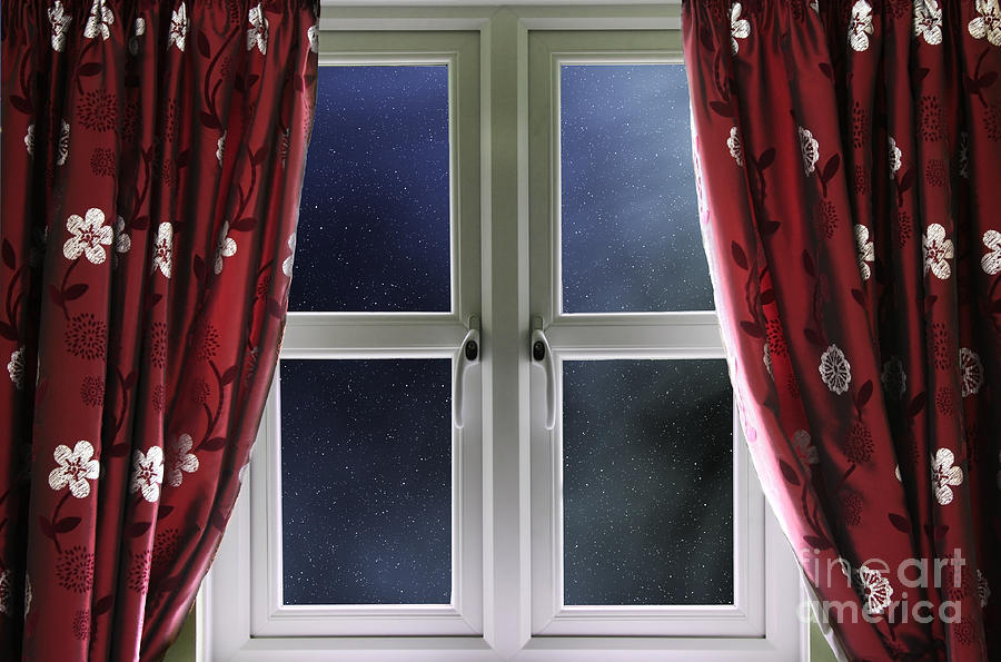 Starry night sky through a window Photograph by Simon Bratt