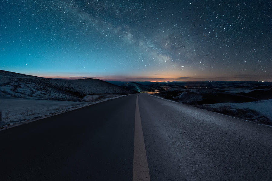 Starry night with empty windy road Photograph by Xuanyu Han
