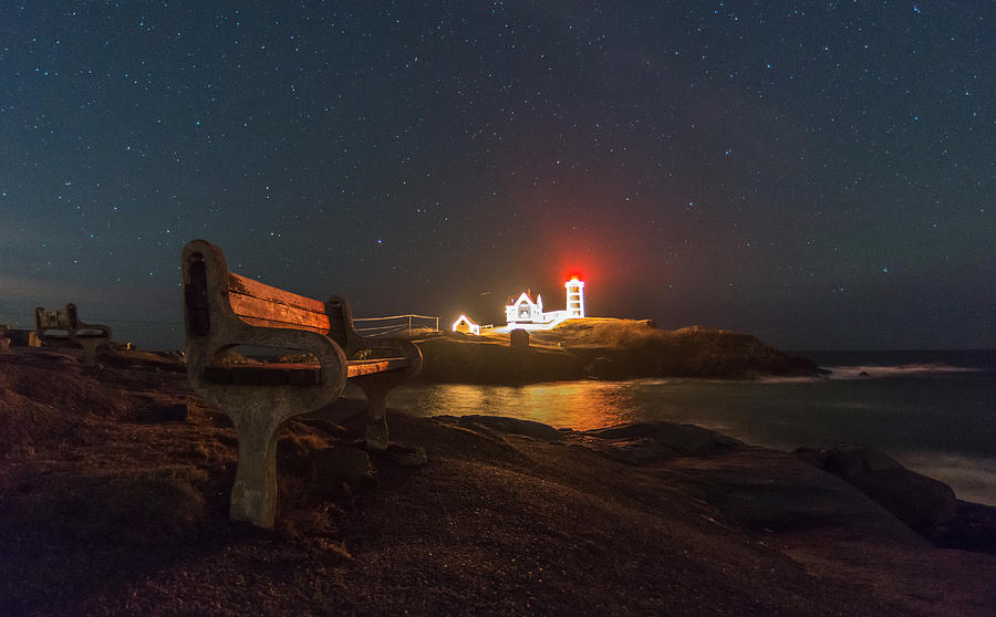 Starry skies over Nubble Lighthouse  Photograph by Bryan Xavier