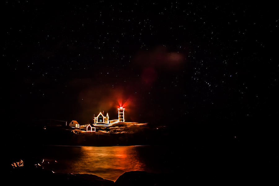 Stars over Nubble Lighthouse Photograph by Jeff Folger