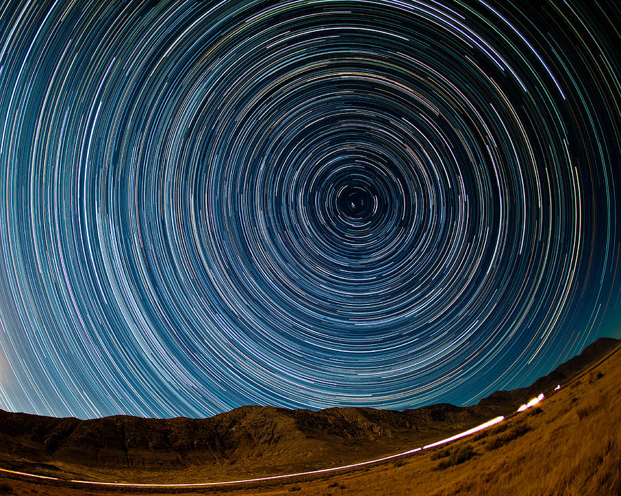 Stars over the Black Rock Photograph by Mark Hammon