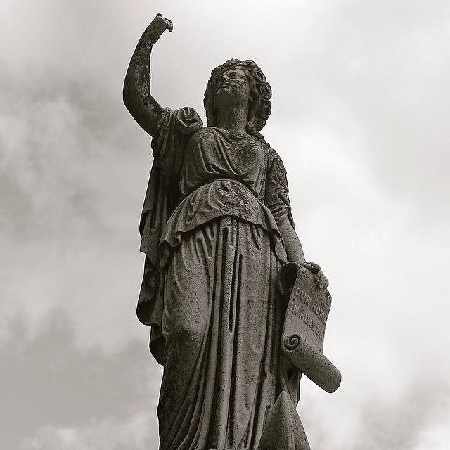Black And White Photograph - Statue And Sky BW by Justin Connor