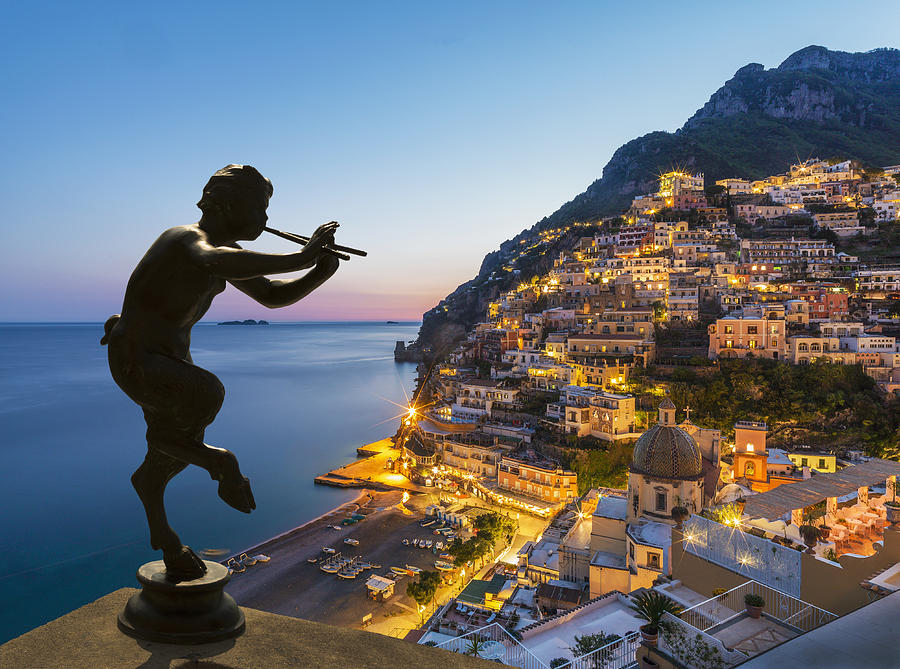 Statue of the God Pan over Positano. Photograph by Buena Vista Images