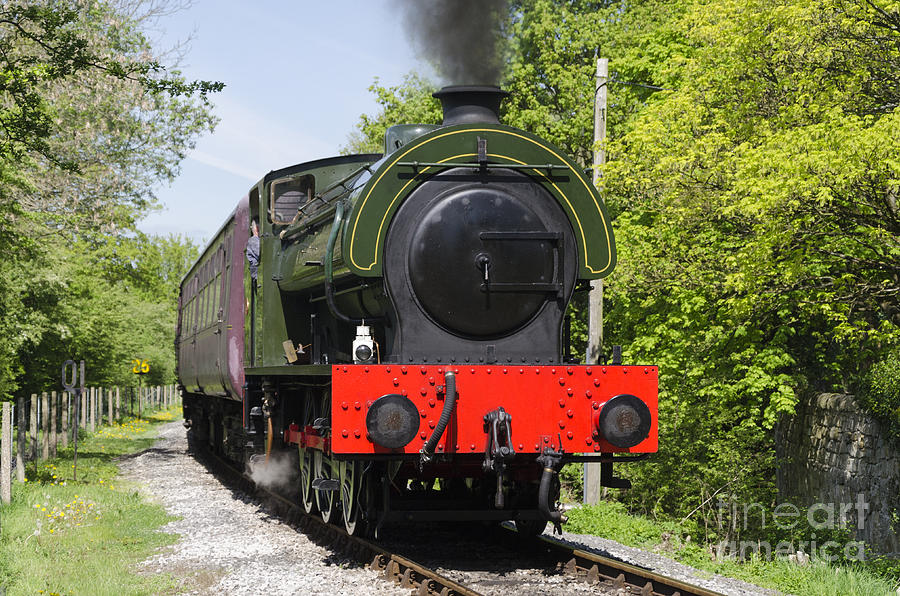 Steam locomotive at Peak Rail Photograph by Steev Stamford