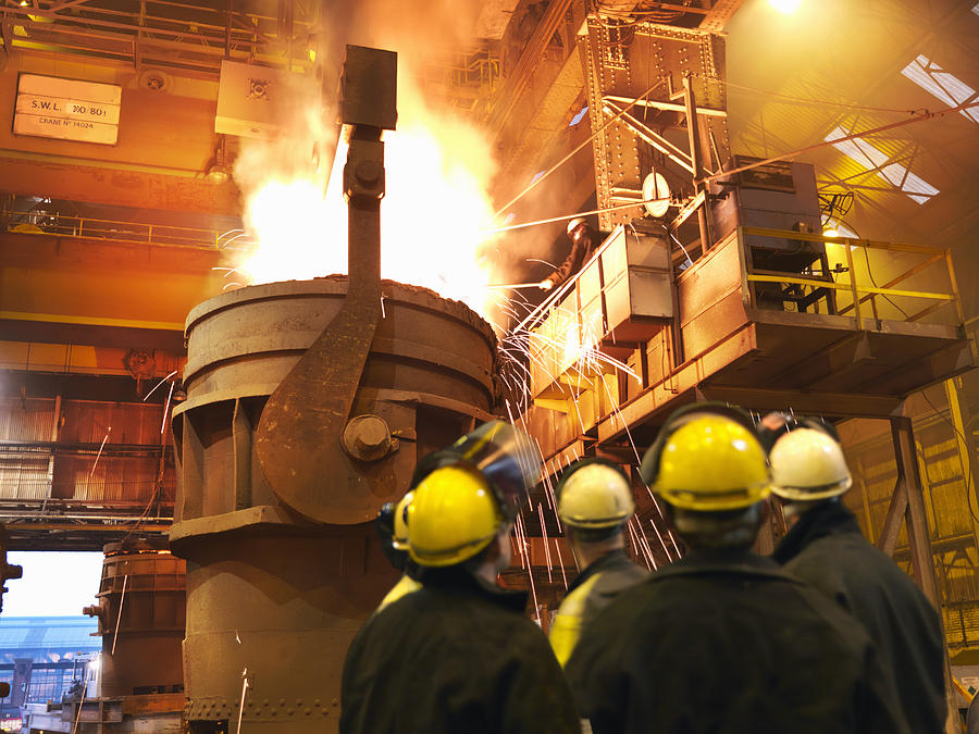 Steel Workers Pouring Molten Steel Photograph by Monty Rakusen