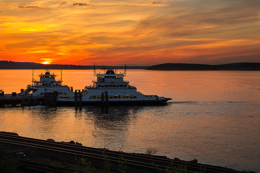 Steilacoom Ferrys at Sunsets Photograph by Rob Green