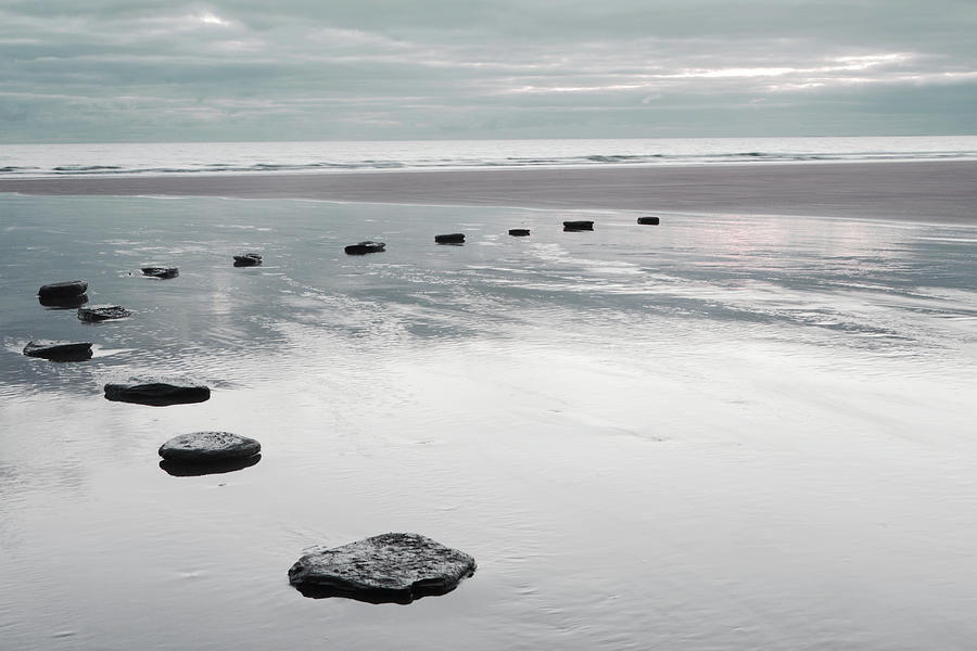 Stepping Stones Over Water On Beach Photograph by Peter Cade