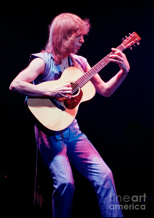 Steve Howe of Yes performing The Clap Photograph by Daniel Larsen