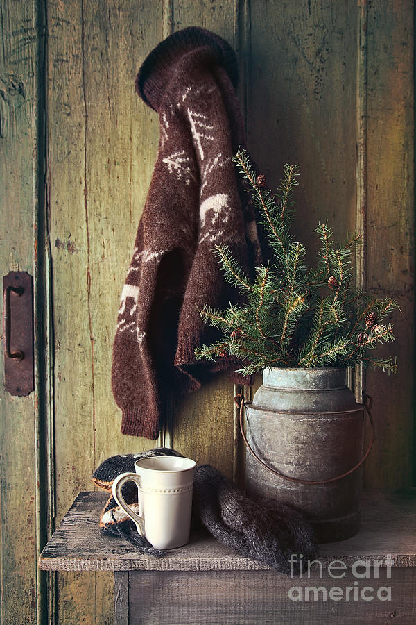 Still life of mug on bench and rustic sweater Photograph by Sandra Cunningham